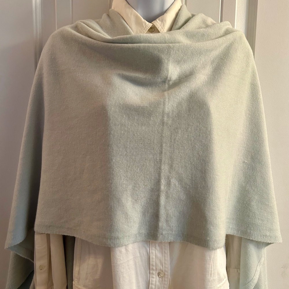 Pale blue poncho, topper and/or scarf. Acrylic with a soft cashmere feel.